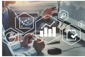 Man at computer with image overlaid by graphs