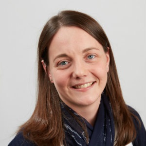 A woman smiling for the camera