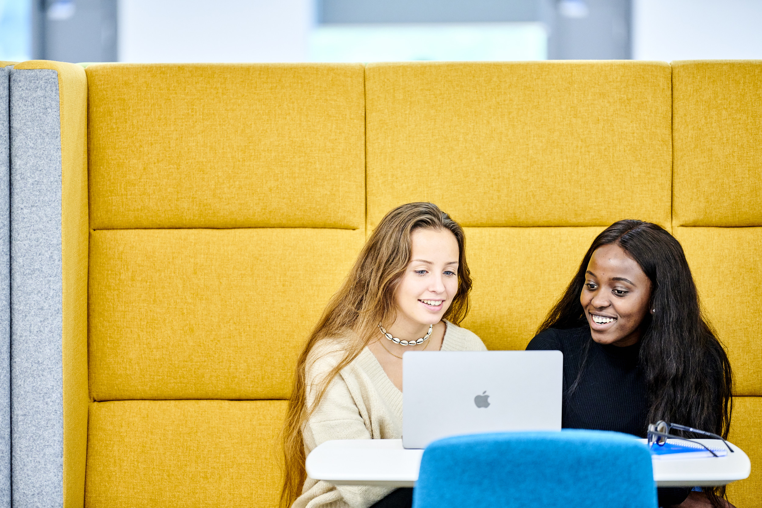 Two students studying in Teaching and Learning Centre