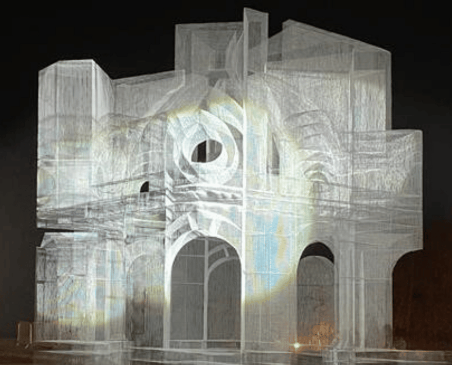 A white illumination of a cathedral crypt