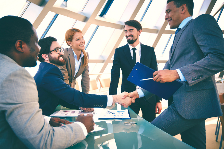 A group of business people around a table