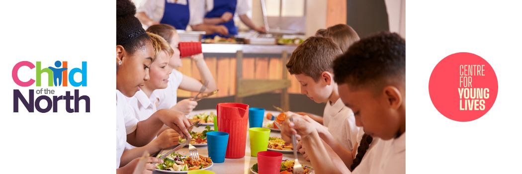 Photograph of school children with school dinners