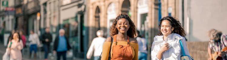 Two female students walking in Durham City