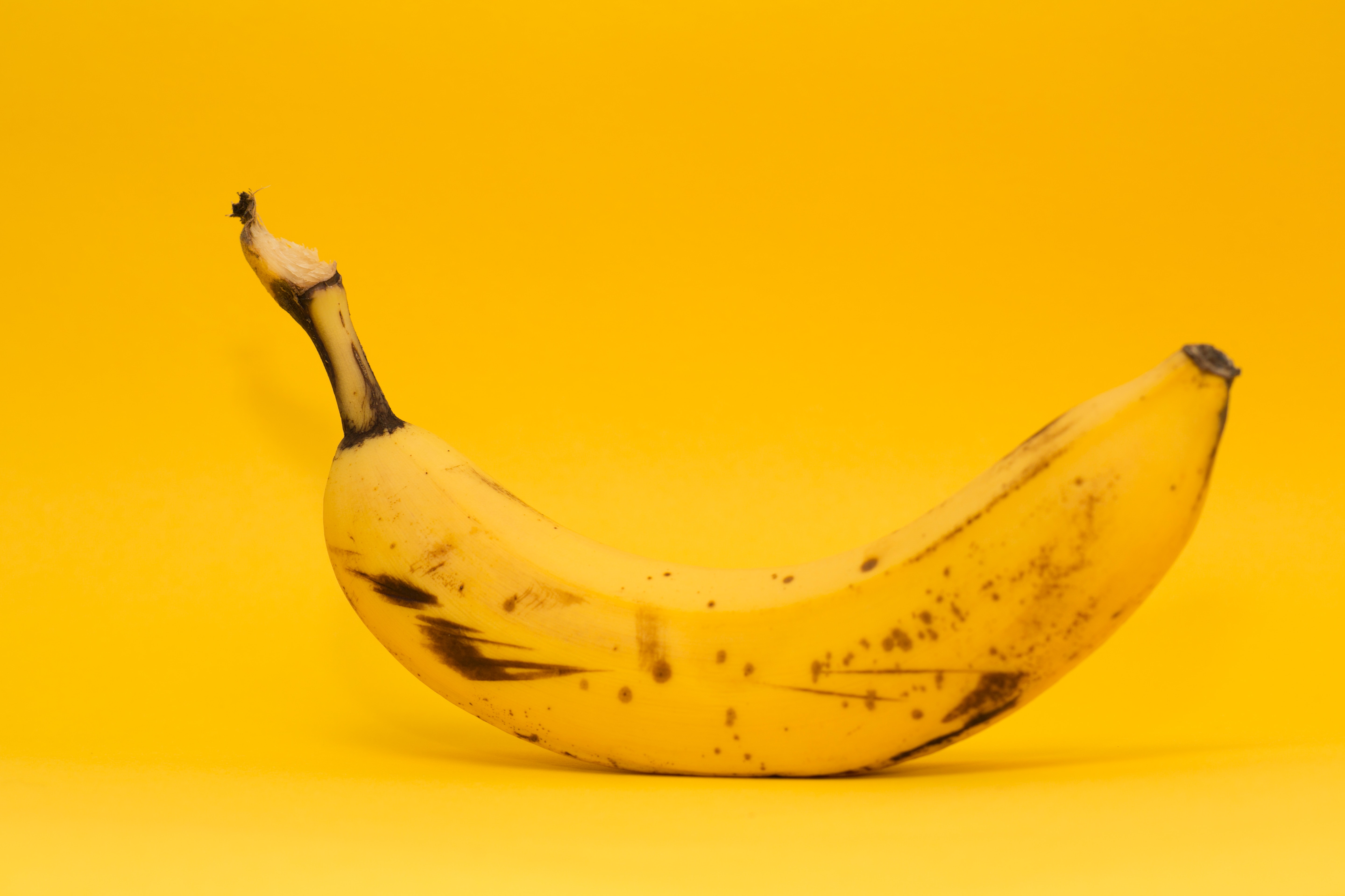 Banana in yellow background