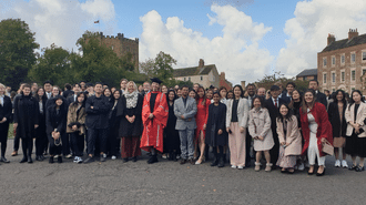 A large group of students on Palace Green