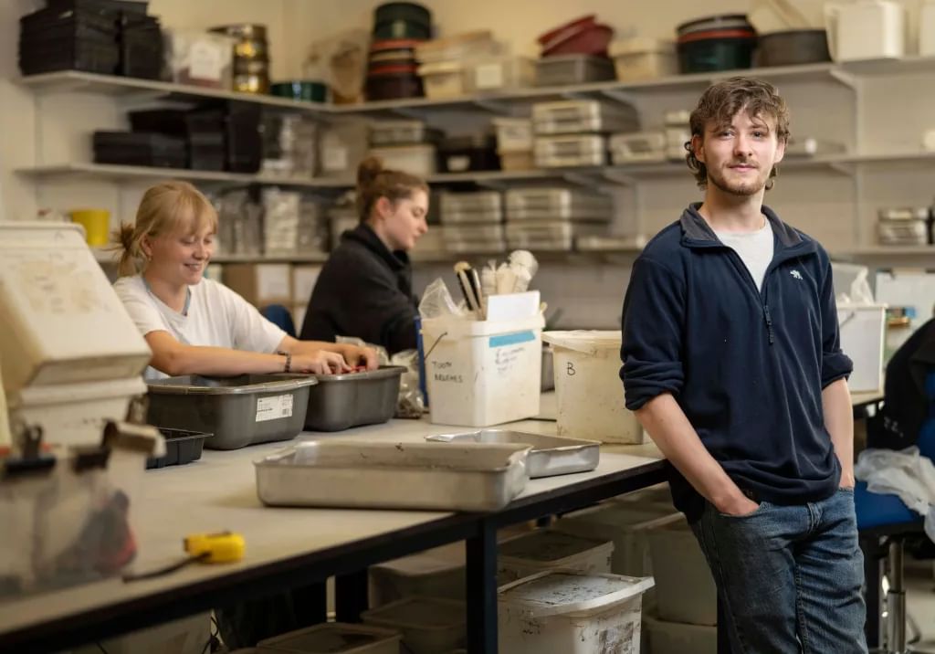 Students working in an archaeology lab