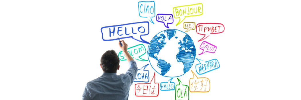 A male, back to camera, points a pen at a screen displaying a globe and 'hello' in different languages