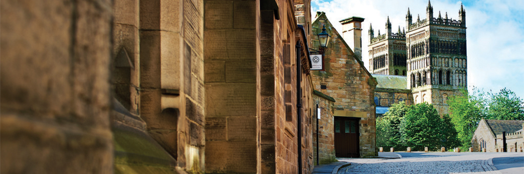 View of Durham Cathedral up a cobbled street