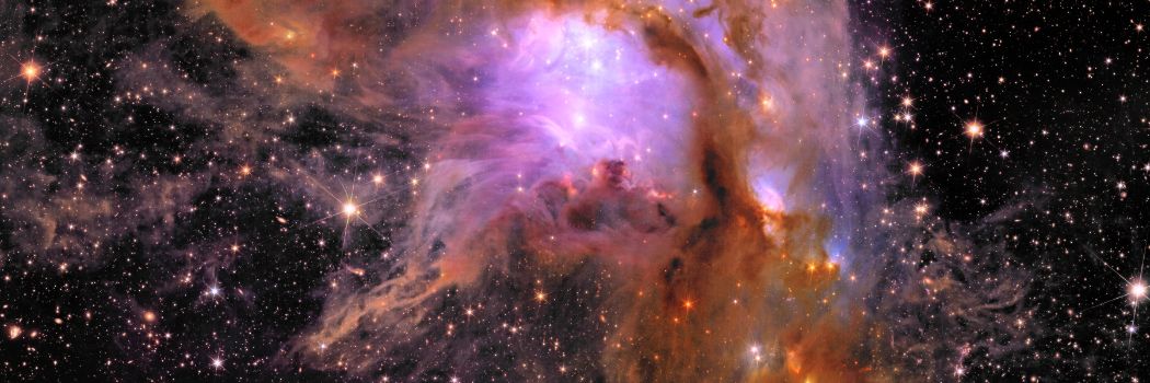 A vibrant nursery of star formation enveloped in a shroud of interstellar dust or purple, red and white