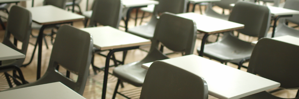 Empty classroom with desks & chairs