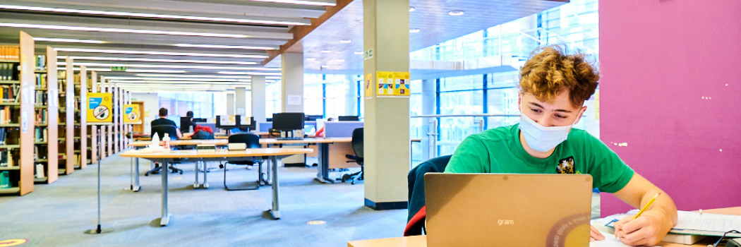 Student sitting in the library