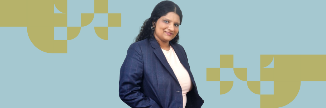 Nandhini Srinivasan wearing a blue blazer and white top