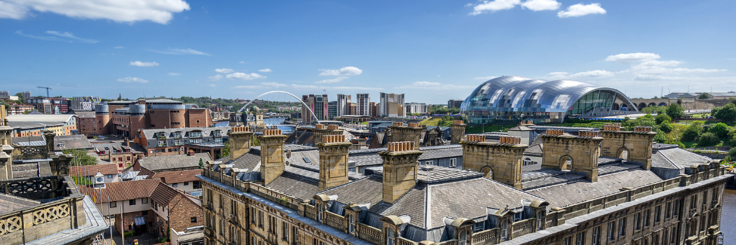 Looking across the rooftops of Newcastle upon Tyne to Gateshead on a sunny day