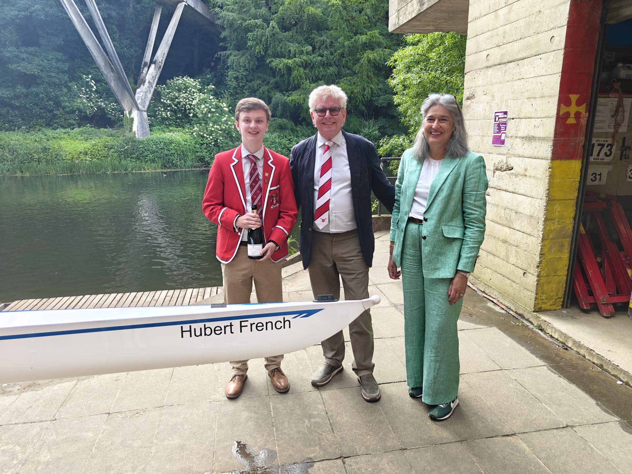 Grey College Boat Club president and Principal with newly donated boat