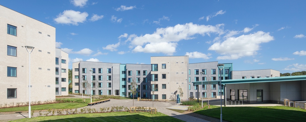 A wide view of the College's accommodation blocks and the central plaza.