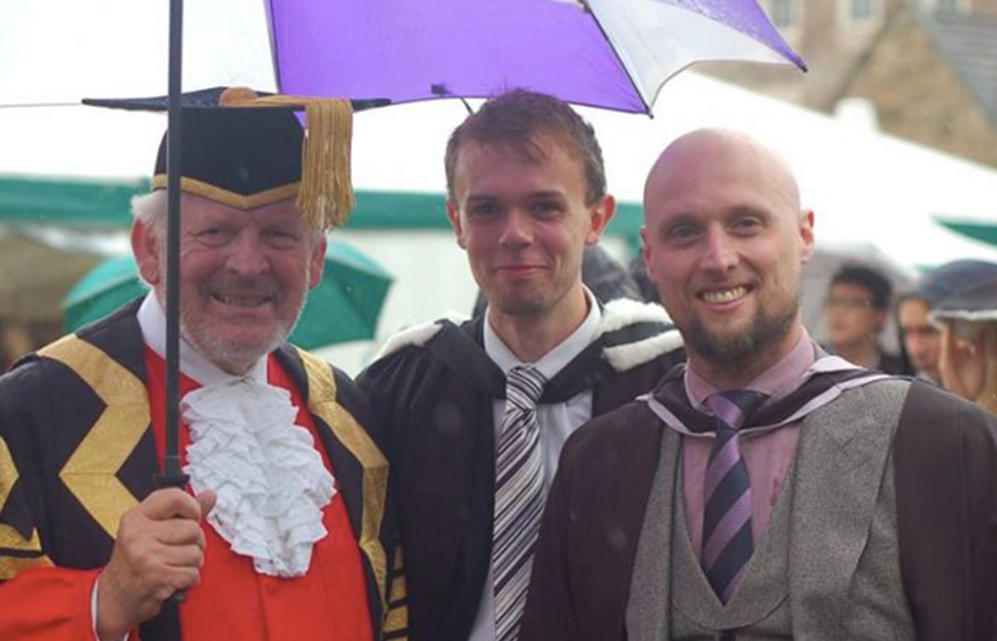 two students with Vice-Chancellor