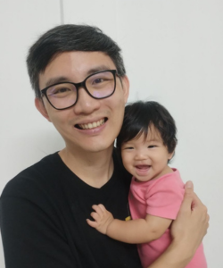 Soo Tian Lee headshot with child