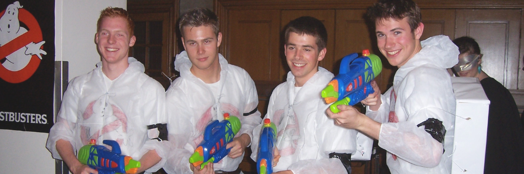 First Men of Mary's dressed as Ghostbusters at a student event