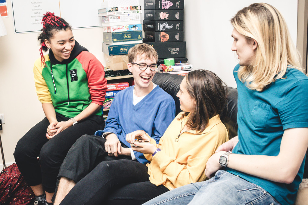 group of students chatting and laughing