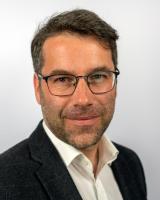 Professional headshot of Felix Ringel