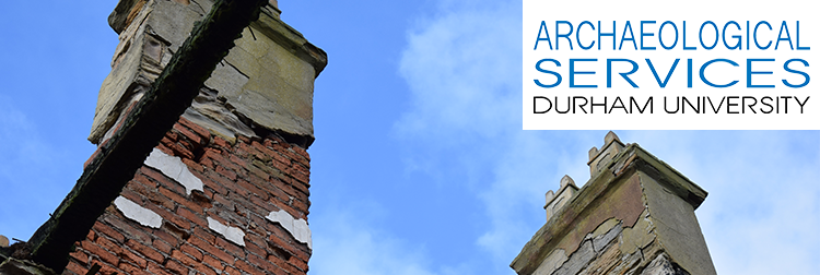 Two old chimneys against a clear blue sky with the Archaeological Services logo in top right