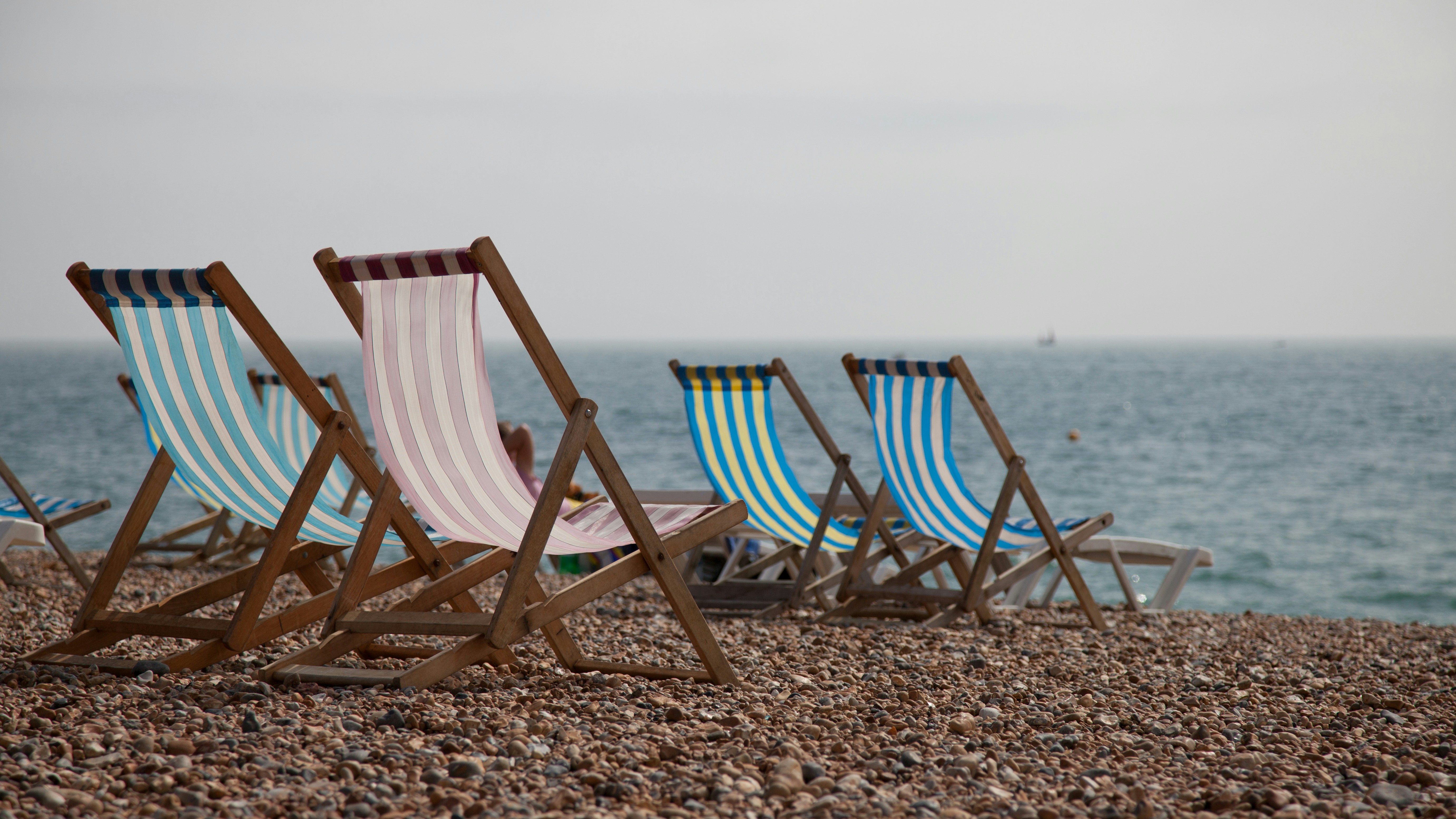 Empty deckchairs on Brighton beach