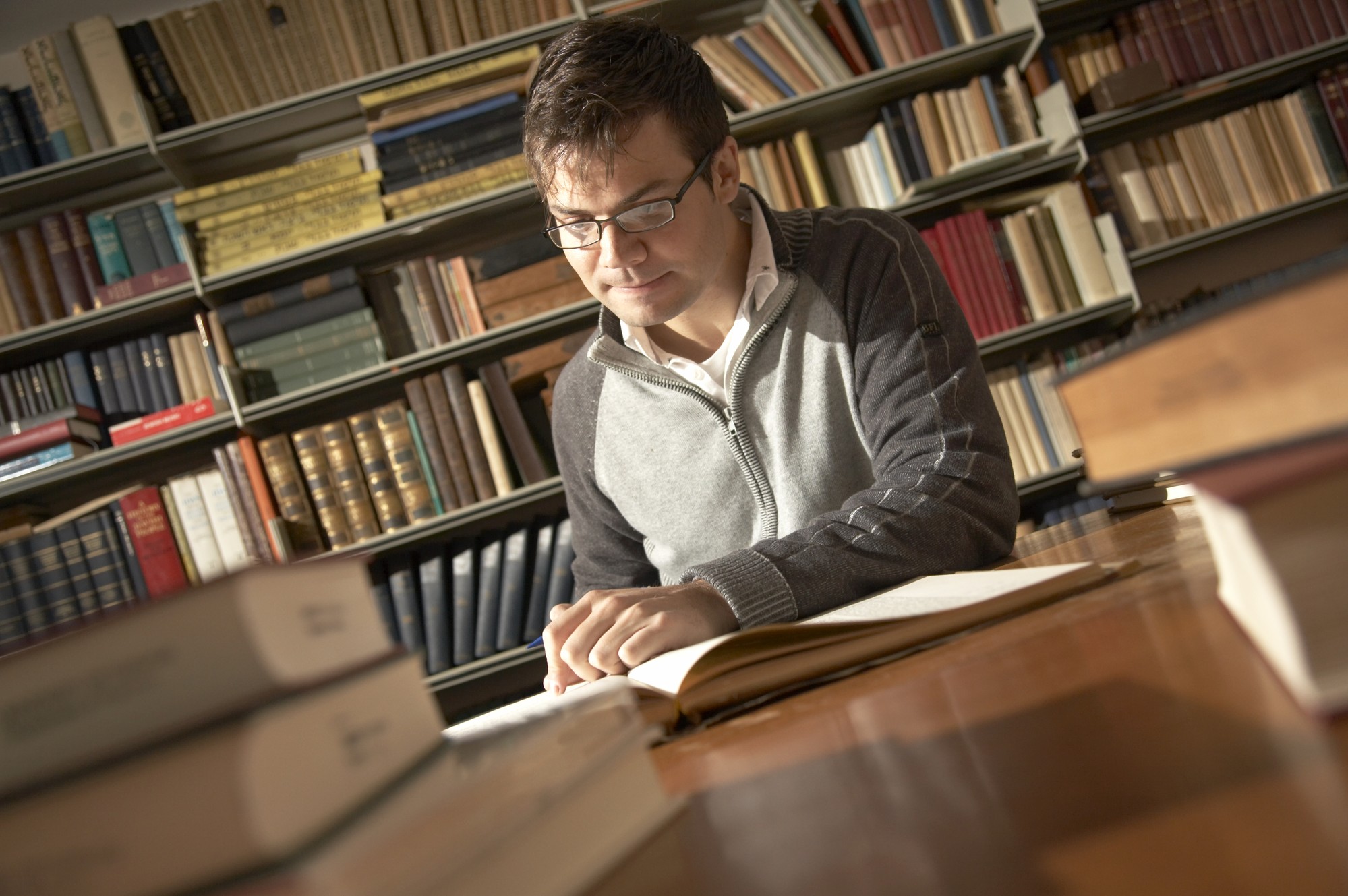Man studying in library