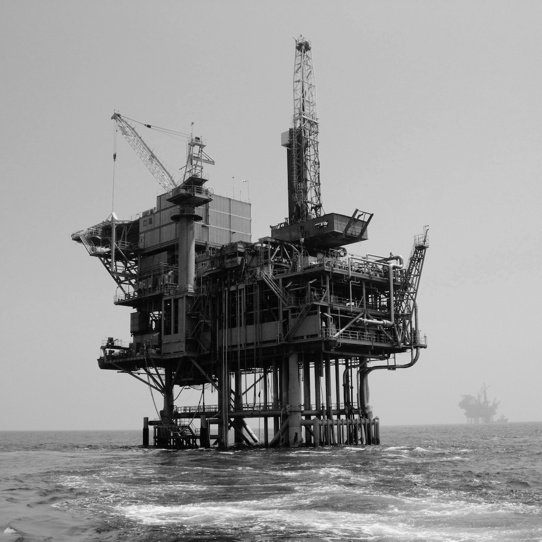 An offshore oil rig at sea