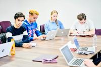 students working on laptops