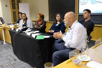 panelists giving a talk