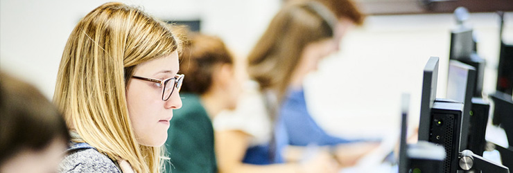 Woman working on mathematical problem