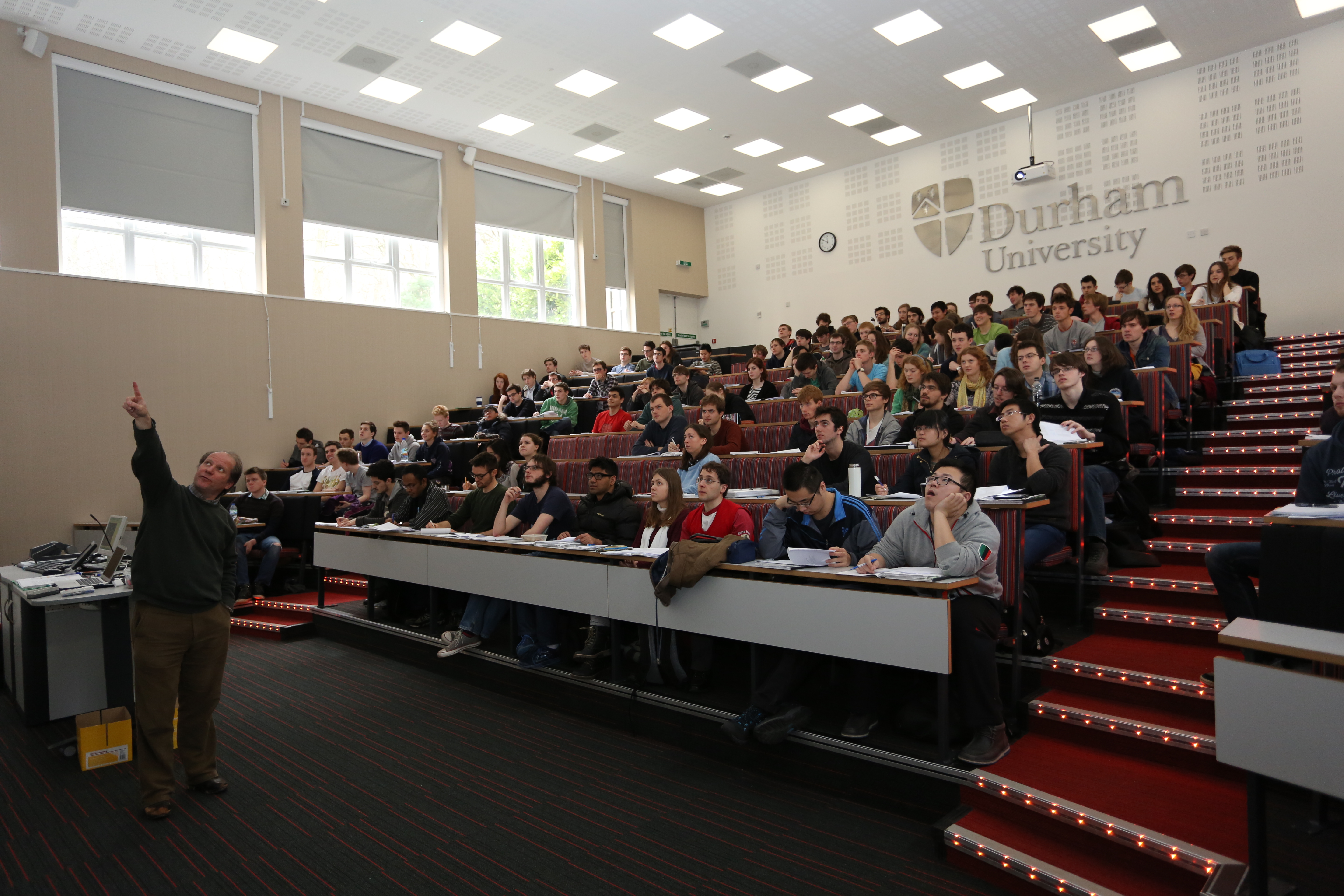 Very modern lecture theatre in the Physics Department full of students having a lecture