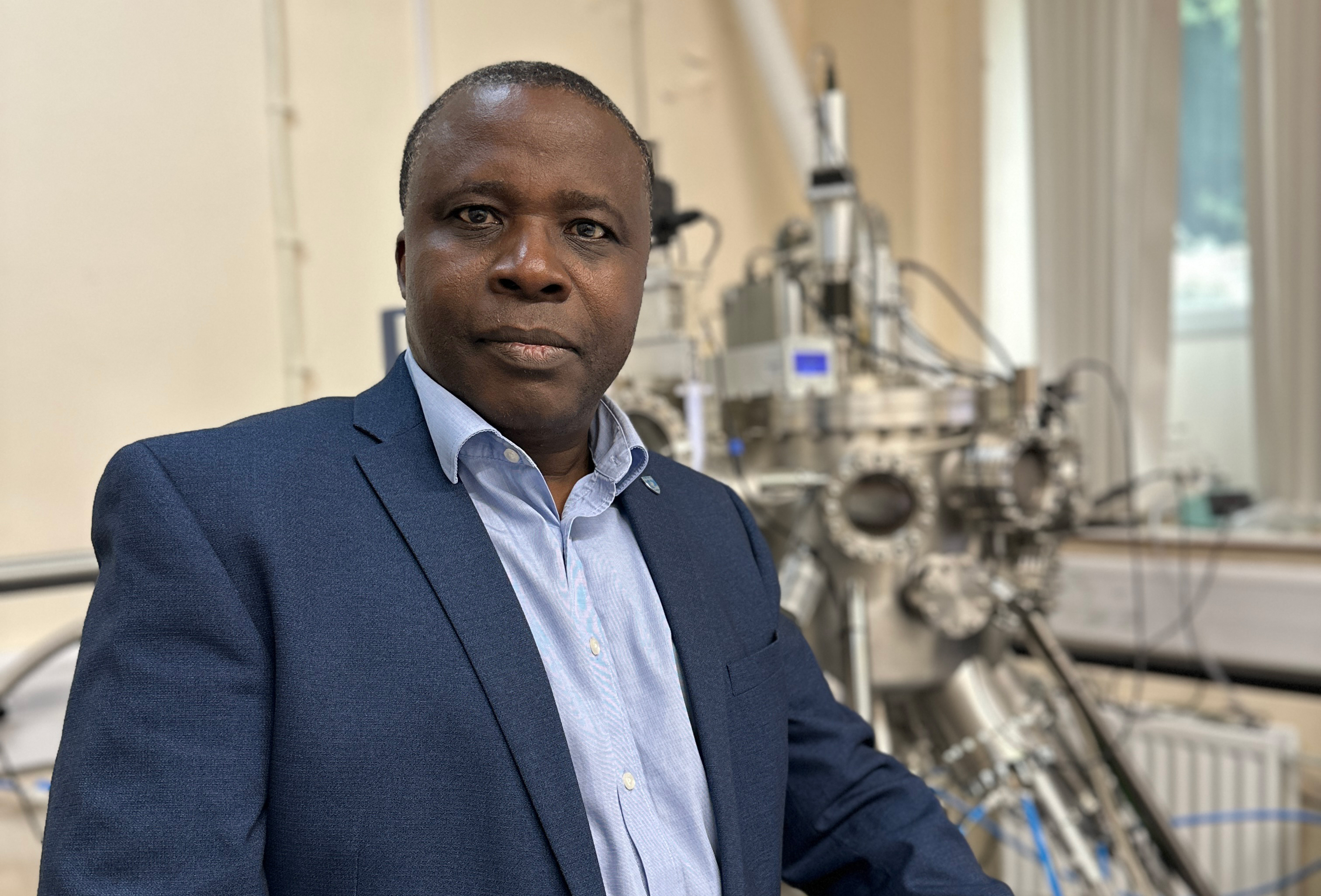 Professor Adekunle Adeyeye in a CMP lab