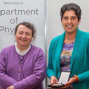 Photograph of Vennessa receiving his award, presented by Paula Chadwick.