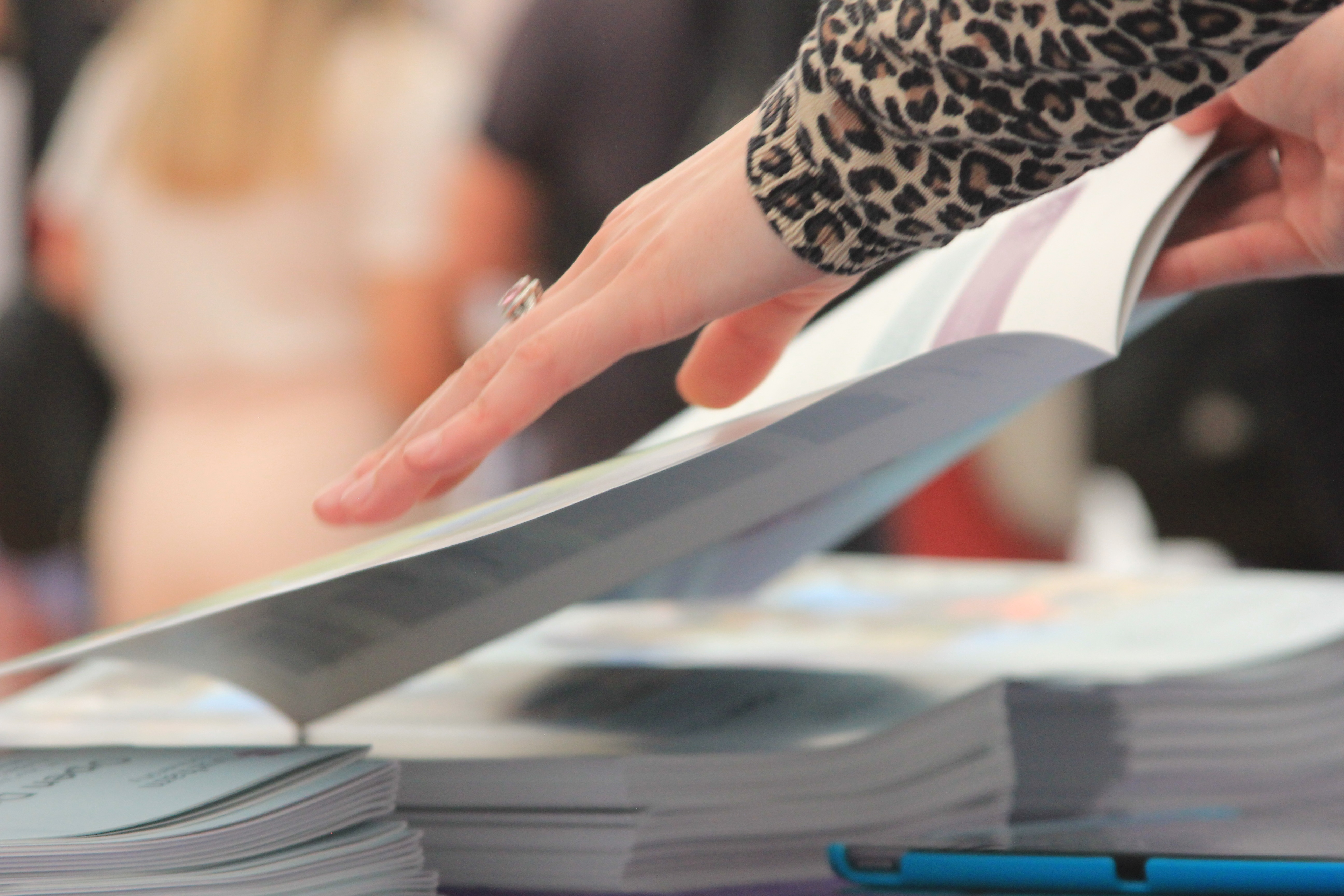 A picture of a hand and University Open Day Programmes