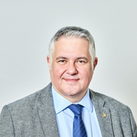 Portrait headshot of Professor Clive Roberts