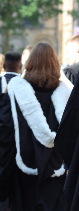 Student graduates in gowns