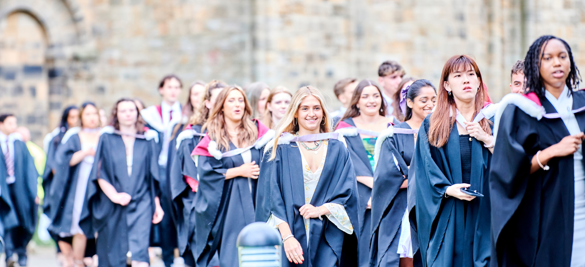 Students gathered during Congregation wearing graduation robes