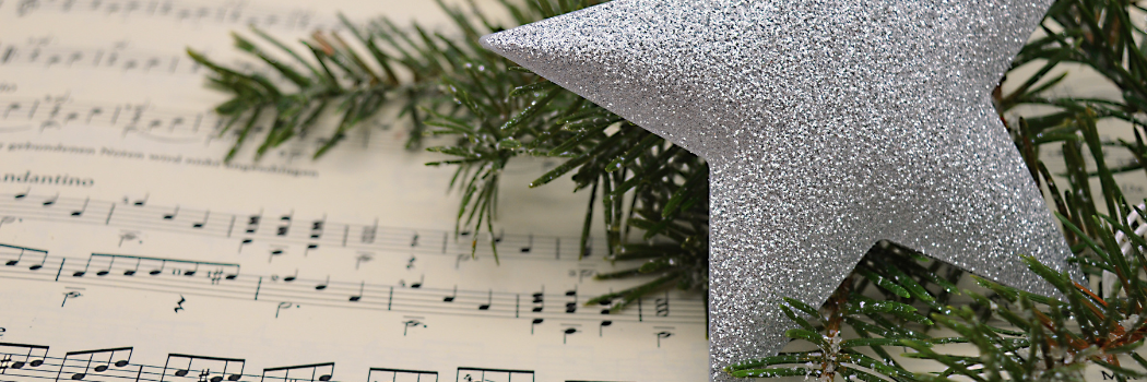 Music sheet, star and tree branch