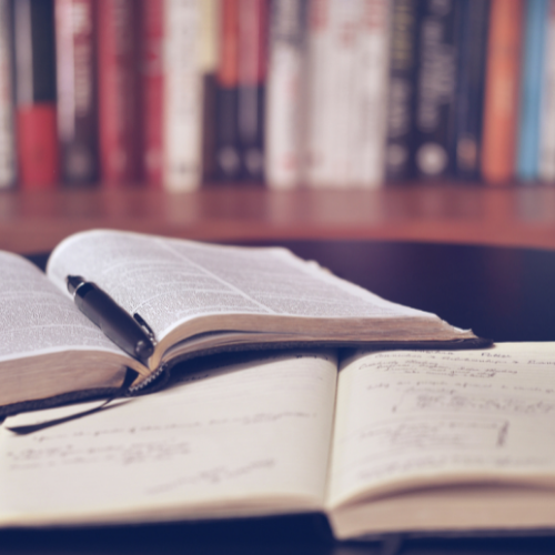 Books and Study Papers on a Desk