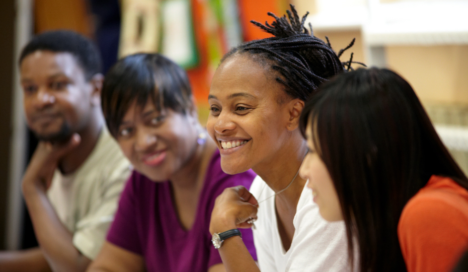 TStudents laughing during a seminar