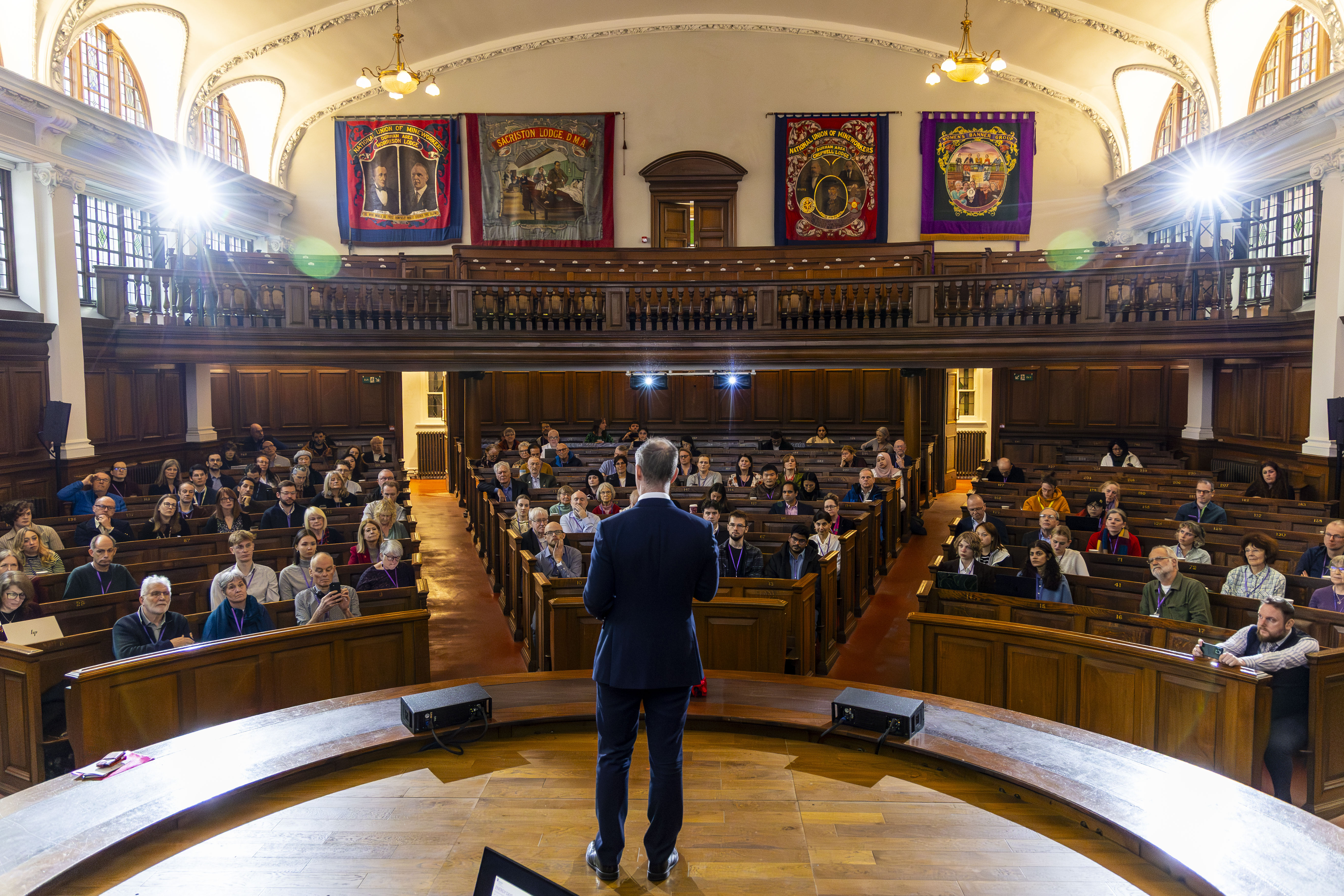 Person speaking to crowd