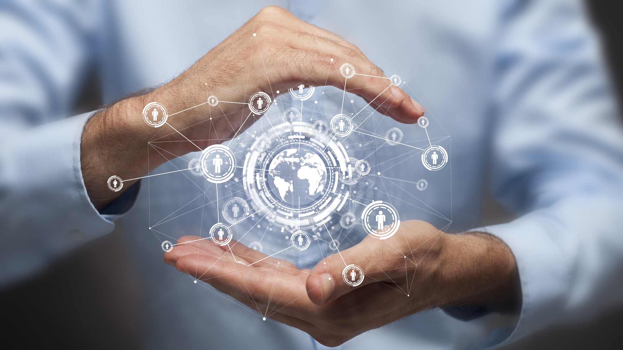 Businessman holding in hand a global connection