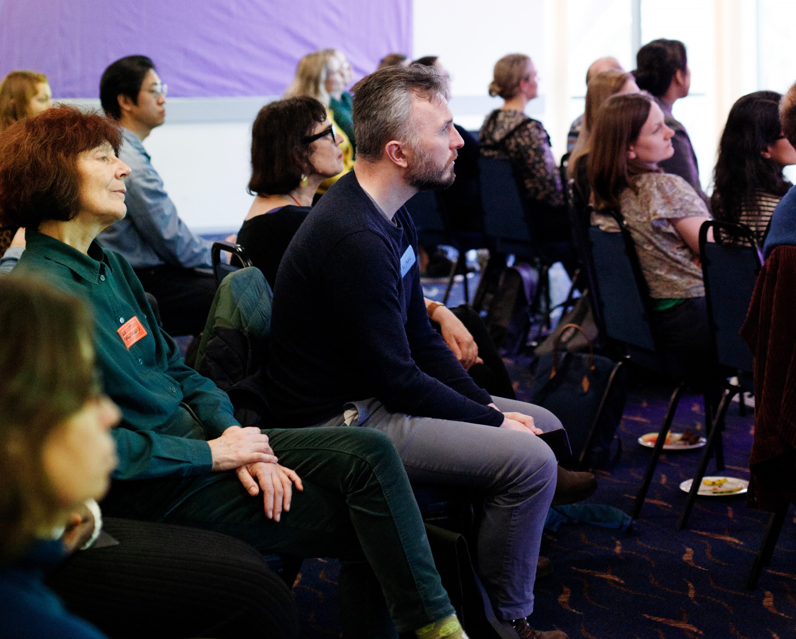 Group of people sat in rows at IMH Fellows event