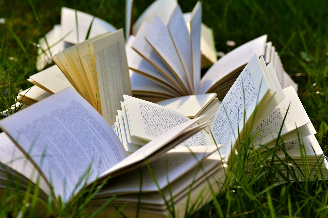 A pile of open books