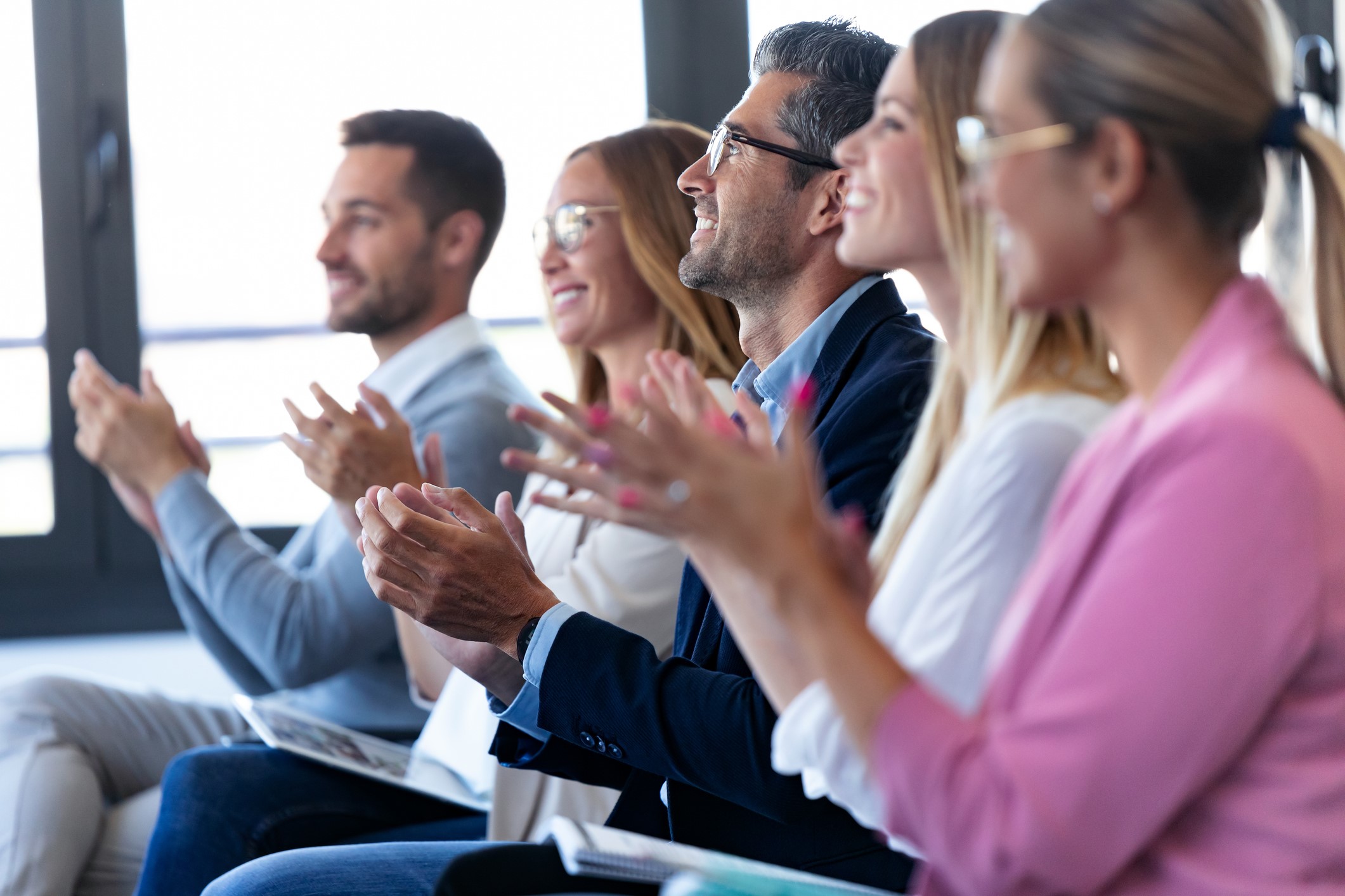 Tpeople listening to a lecture