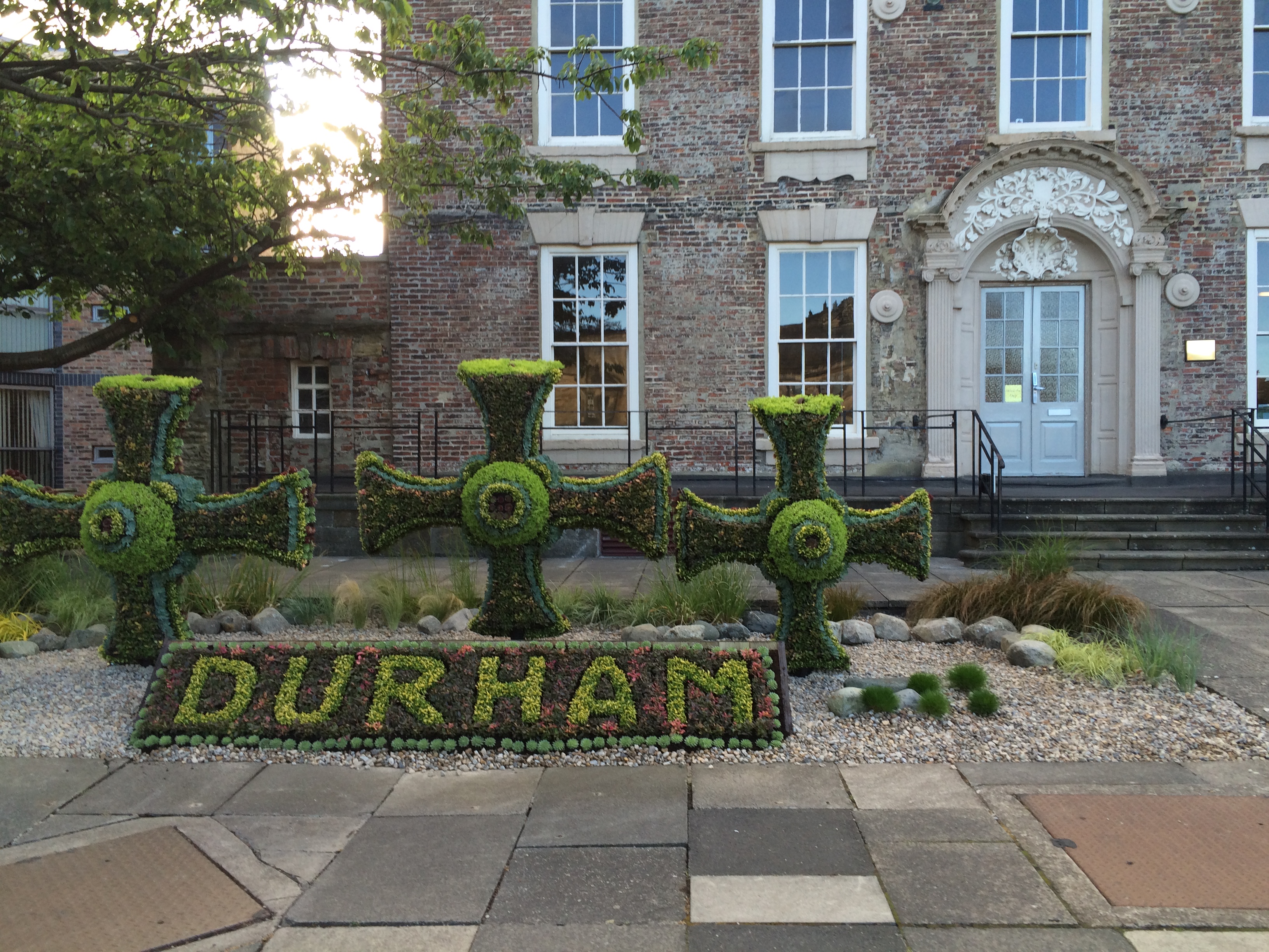 exterior image of Cosin's Hall with St Cuthbert crosses