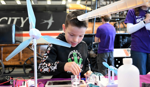 Boy enjoying an experiment