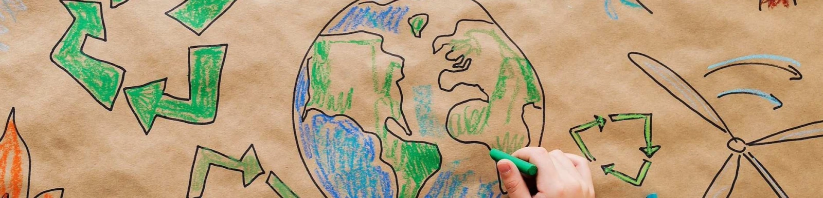 Banner showing a child colouring in the earth with a crayon