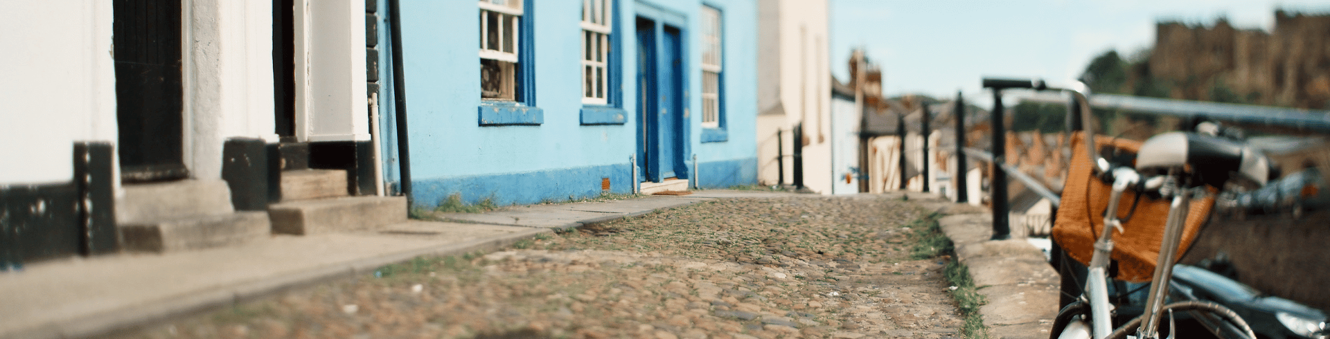 Cobbled Durham street with a bicycle on the right